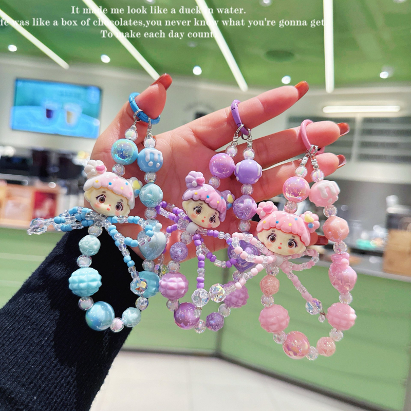 Karikatura-akrilni privjesak za telefon s kristalnom mašnicom i nizu od perlica (Brand: Hibiscus Jewelry; Materijal: Akril; Obrada: Elektropaljivanje; Vzor: Zvjezdice/Sunce i Mjesec/Nebesa; Stil: Crtani, Dodaci za telefon)
