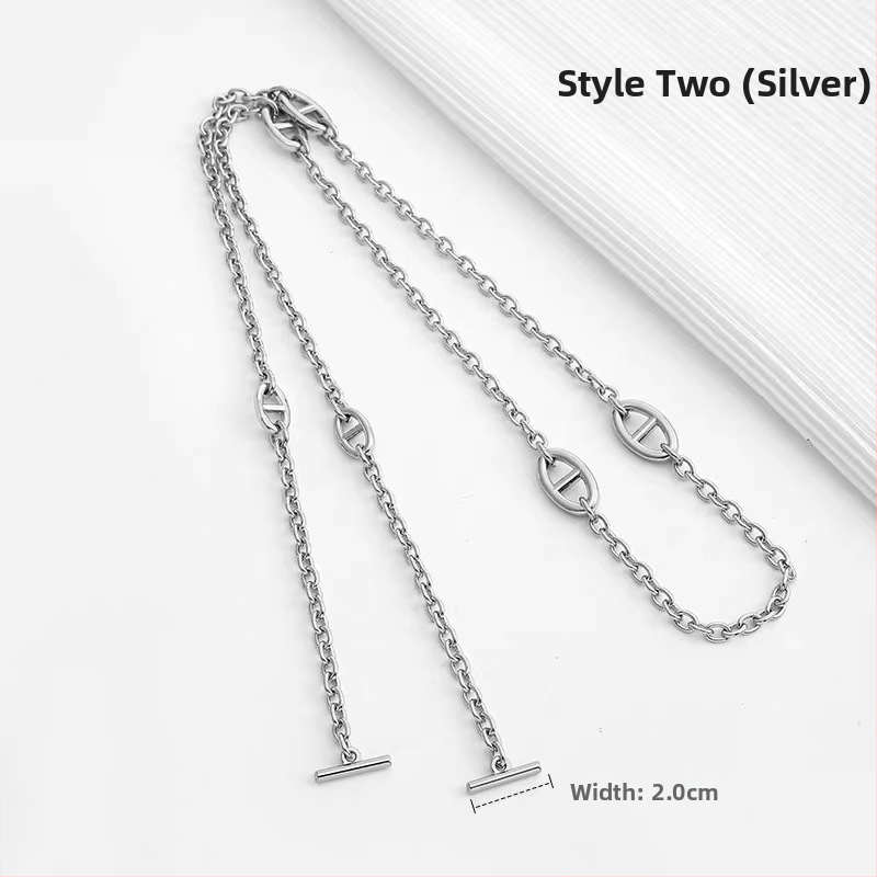 Ζώνη τσάντας/ώμου Yu Yi, μεταλλική, γεωμετρικό μοτίβο, εξουσιοδοτημένη ιδιωτική μάρκα, άνοιξη 2023.