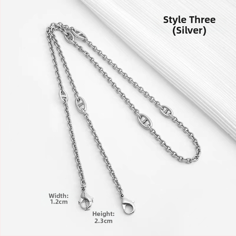 Ζώνη τσάντας/ώμου Yu Yi, μεταλλική, γεωμετρικό μοτίβο, εξουσιοδοτημένη ιδιωτική μάρκα, άνοιξη 2023.