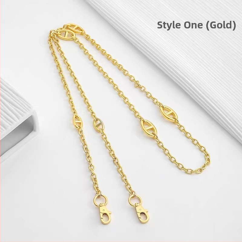 Ζώνη τσάντας/ώμου Yu Yi, μεταλλική, γεωμετρικό μοτίβο, εξουσιοδοτημένη ιδιωτική μάρκα, άνοιξη 2023.