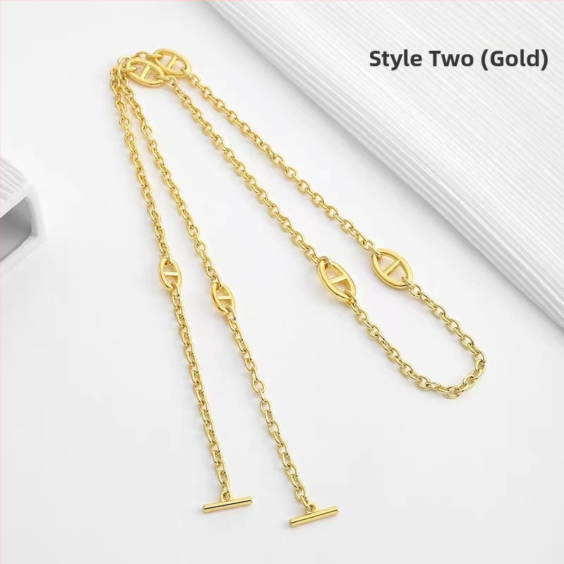 Ζώνη τσάντας/ώμου Yu Yi, μεταλλική, γεωμετρικό μοτίβο, εξουσιοδοτημένη ιδιωτική μάρκα, άνοιξη 2023.