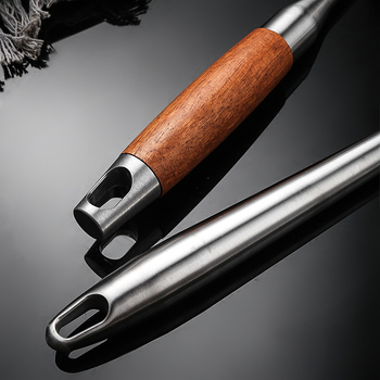 A good family μαγειρική σπάτουλα με διχτυωτή επιφάνεια από 201 ανοξείδωτο χάλυβα και λαβή από ατσάλι-ξύλο; μη κολλάει, αντιολισθητική, αντοχή σε υψηλές θερμοκρασίες; ιδανική για νούντλς, γεμιστά και κατσαρόλες.