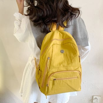 Rucsac din nylon, capacitate 20–35 L, compartiment pentru laptop, bretele curbate