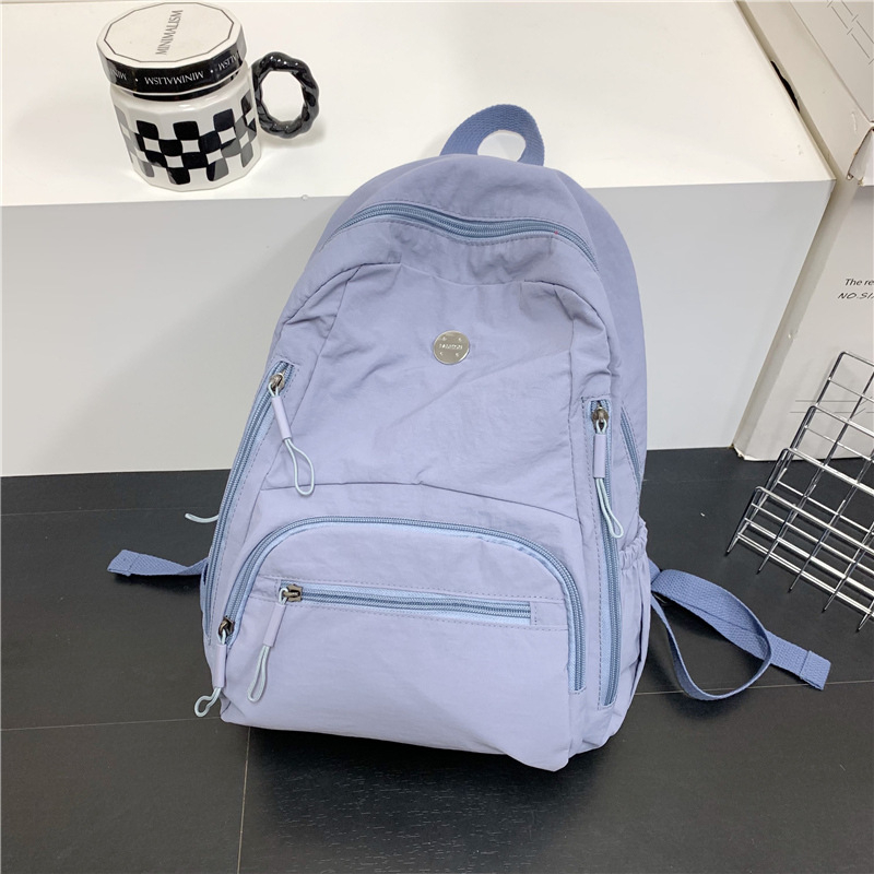 Rucsac din nylon, capacitate 20–35 L, compartiment pentru laptop, bretele curbate