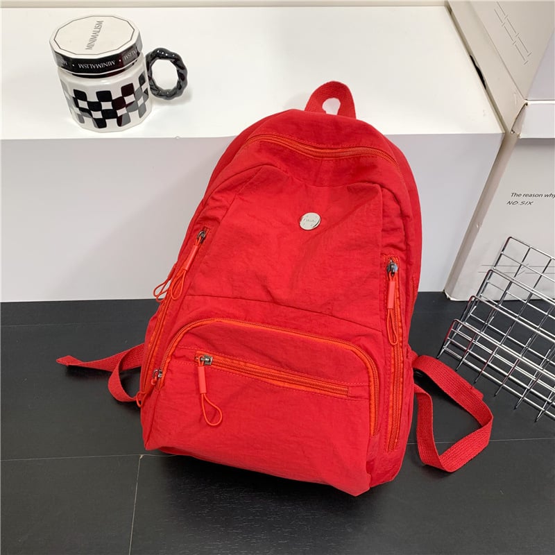 Rucsac din nylon, capacitate 20–35 L, compartiment pentru laptop, bretele curbate