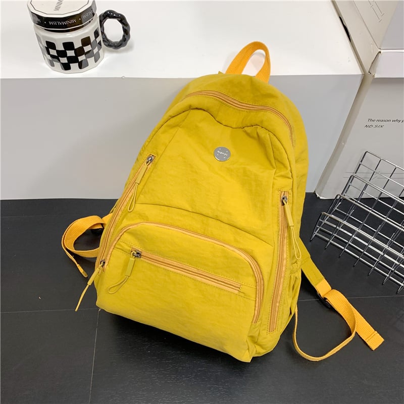Rucsac din nylon, capacitate 20–35 L, compartiment pentru laptop, bretele curbate