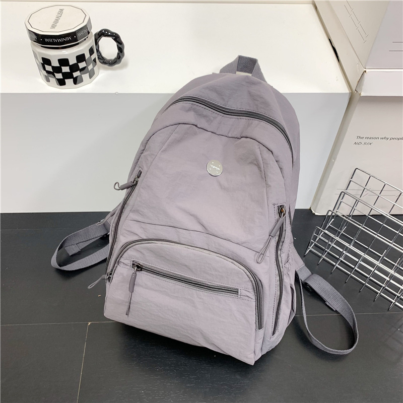 Rucsac din nylon, capacitate 20–35 L, compartiment pentru laptop, bretele curbate