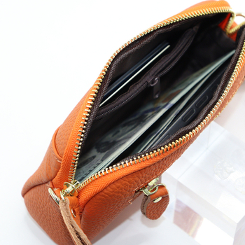Ženska torba od prave kože, prvi sloj teleće kože, konvertibilna torba – clutch ili ručna, može se nositi kao preko ramena, zatvaranje na zip, poliester podstava