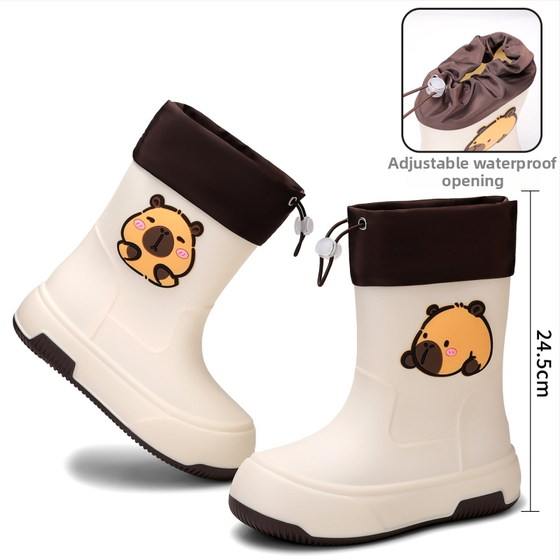 Moteriški PVC lietaus batai, vidutinio ilgio, storesnė padas, karikatūrų raštas, žemas kulnas
