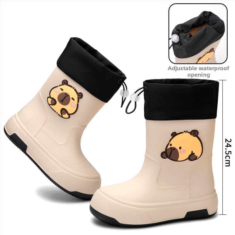 Moteriški PVC lietaus batai, vidutinio ilgio, storesnė padas, karikatūrų raštas, žemas kulnas