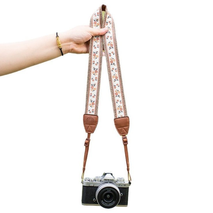 Bretea de aparat foto pentru camere fără oglindă, cu design dantelat; compatibilă cu Canon R50, Sony ZV-E10, Fuji XT50 și Nikon Z30; personalizabilă în funcție de mostră.