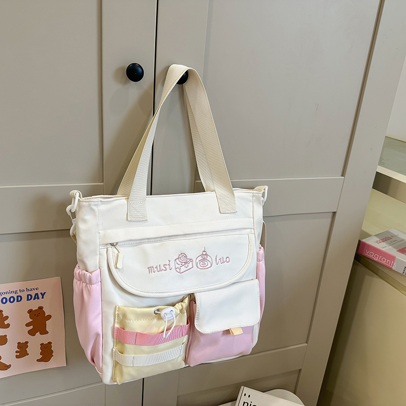 Školska torba za djevojčice, lagana i proširiva, crossbody torba za školu s velikom kapaciteto, od najlona s poliesterom podstavom