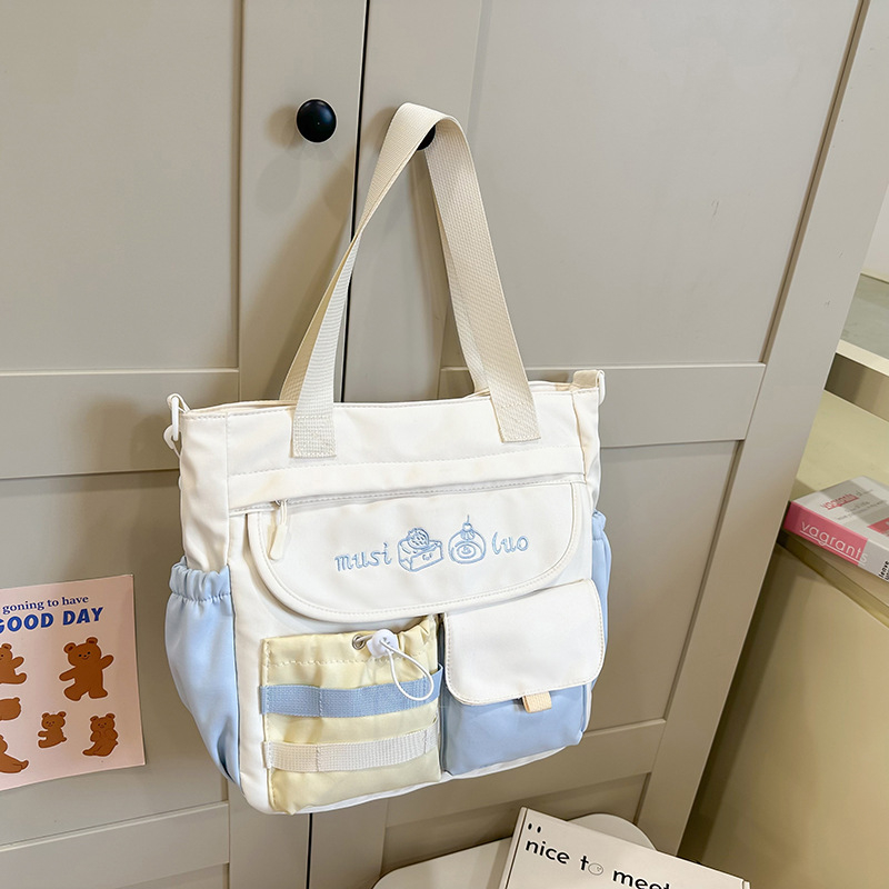 Školska torba za djevojčice, lagana i proširiva, crossbody torba za školu s velikom kapaciteto, od najlona s poliesterom podstavom