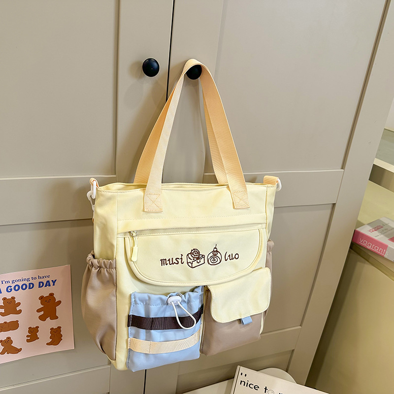 Školska torba za djevojčice, lagana i proširiva, crossbody torba za školu s velikom kapaciteto, od najlona s poliesterom podstavom