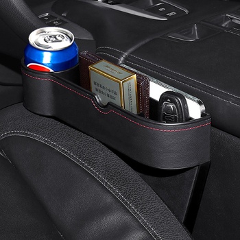 Glabāšanas kaste vietā starp sēdekļiem – āda, ūdensnecaurlaidīga, izturīga pret spiedienu, pakarināms uzstādījums