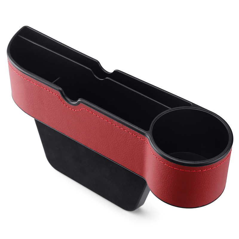 Glabāšanas kaste vietā starp sēdekļiem – āda, ūdensnecaurlaidīga, izturīga pret spiedienu, pakarināms uzstādījums