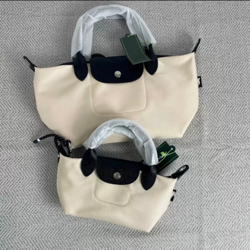 Geantă Tote Dumpling cu capac – piele naturală, formă gălușă, deschidere cu capac, buzunar intern pentru documente