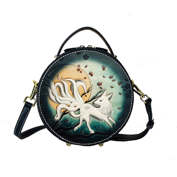 Tune Cobbler crossbody torba - kružnog oblika, prirodna koža, ručno izgravirana koža, zatvarač