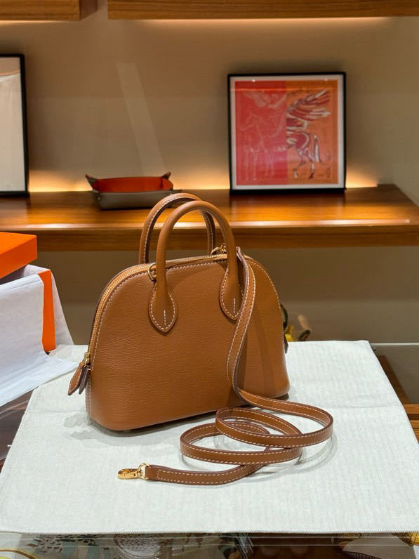 Geantă din piele, formă de scoică, cu fermoar – crossbody