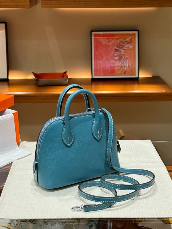 Geantă din piele, formă de scoică, cu fermoar – crossbody