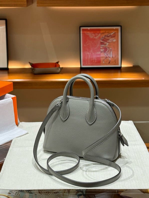 Geantă din piele, formă de scoică, cu fermoar – crossbody