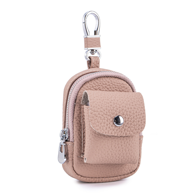 Μίνι τσαντάκι μέσης από γνήσιο δέρμα για κλειδιά και αξεσουάρ — μονόχρωμο σχέδιο, αστικός μινιμαλισμός, επένδυση από γνήσιο δέρμα, κυκλοφορία φθινοπωρινή 2025