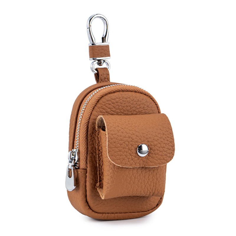 Μίνι τσαντάκι μέσης από γνήσιο δέρμα για κλειδιά και αξεσουάρ — μονόχρωμο σχέδιο, αστικός μινιμαλισμός, επένδυση από γνήσιο δέρμα, κυκλοφορία φθινοπωρινή 2025