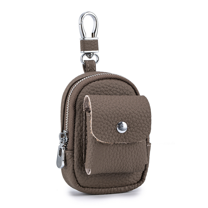 Μίνι τσαντάκι μέσης από γνήσιο δέρμα για κλειδιά και αξεσουάρ — μονόχρωμο σχέδιο, αστικός μινιμαλισμός, επένδυση από γνήσιο δέρμα, κυκλοφορία φθινοπωρινή 2025