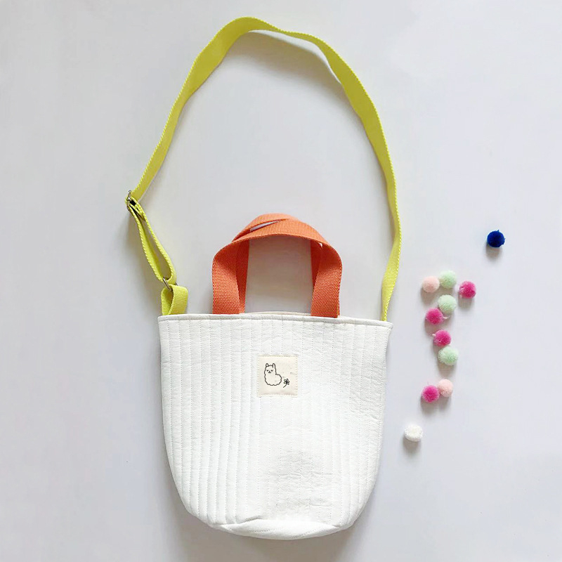 Ženska platnena crossbody torba, mala okrugla quiltirana torba s šnimom za zatvaranje i džepom za telefon