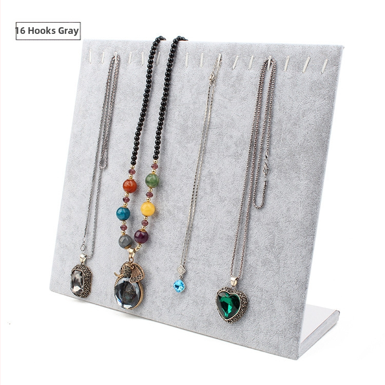 Stolný výstavný stojan na šperky: stojan na náušnice, náhrdelníky a náramky, z hustej dosky s flanelovým krytím, tvaru L, jednovrstvový, umelecký štýl