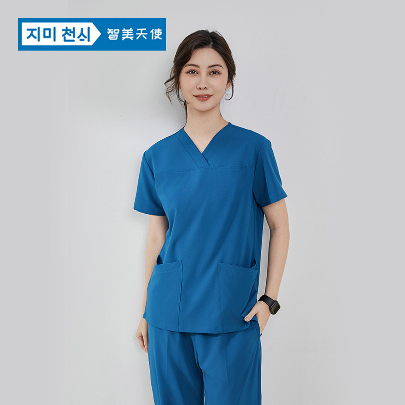 Unisex medicinski scrubs kratkih rukava s V‑dekolteom, poliester 90–95%, antistatički