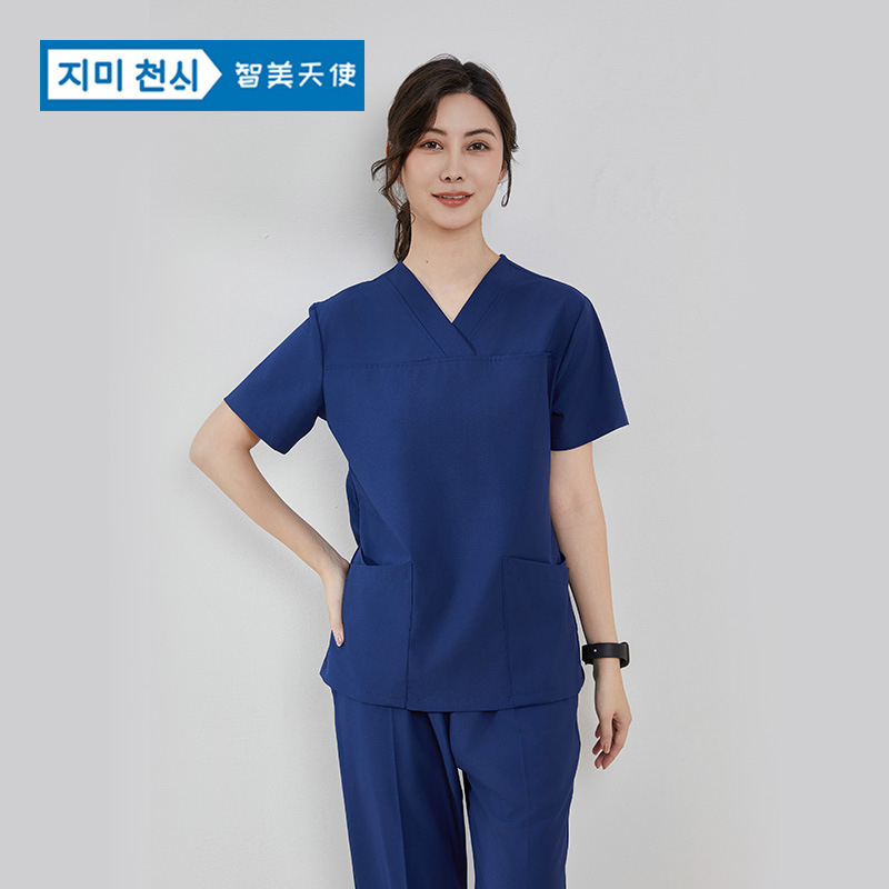 Unisex medicinski scrubs kratkih rukava s V‑dekolteom, poliester 90–95%, antistatički