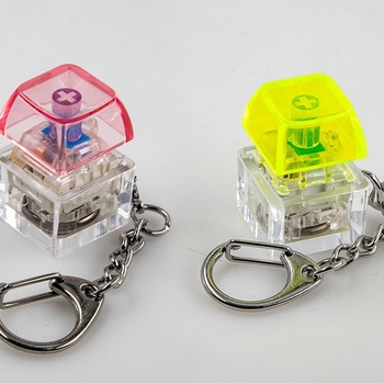 Privjesak za ključeve - Elektronički svijetleći drveni ribica privjesak, PVC dodatak (Crtić stil)