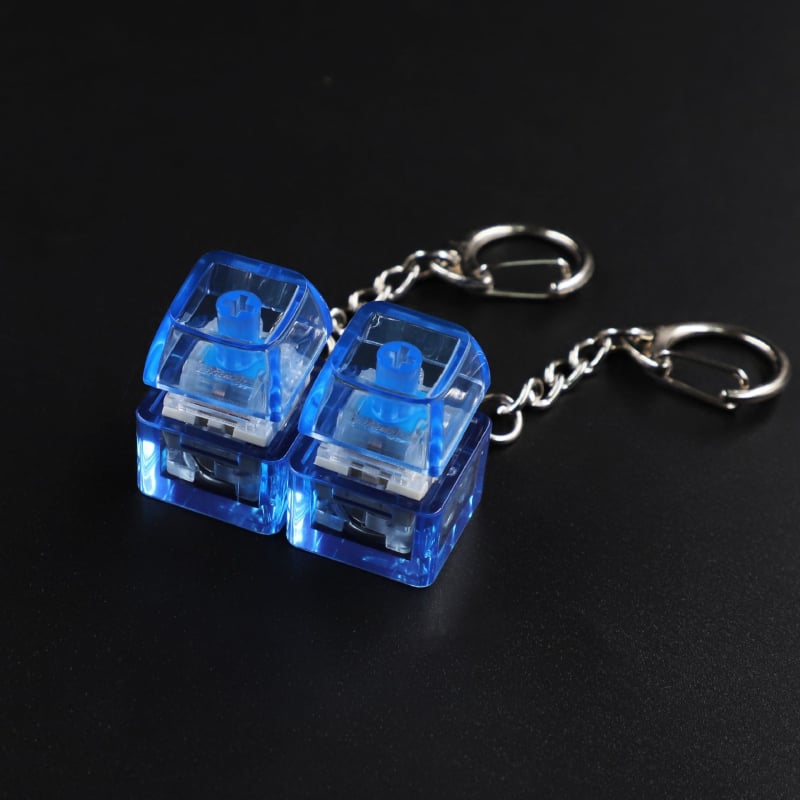 Privjesak za ključeve - Elektronički svijetleći drveni ribica privjesak, PVC dodatak (Crtić stil)