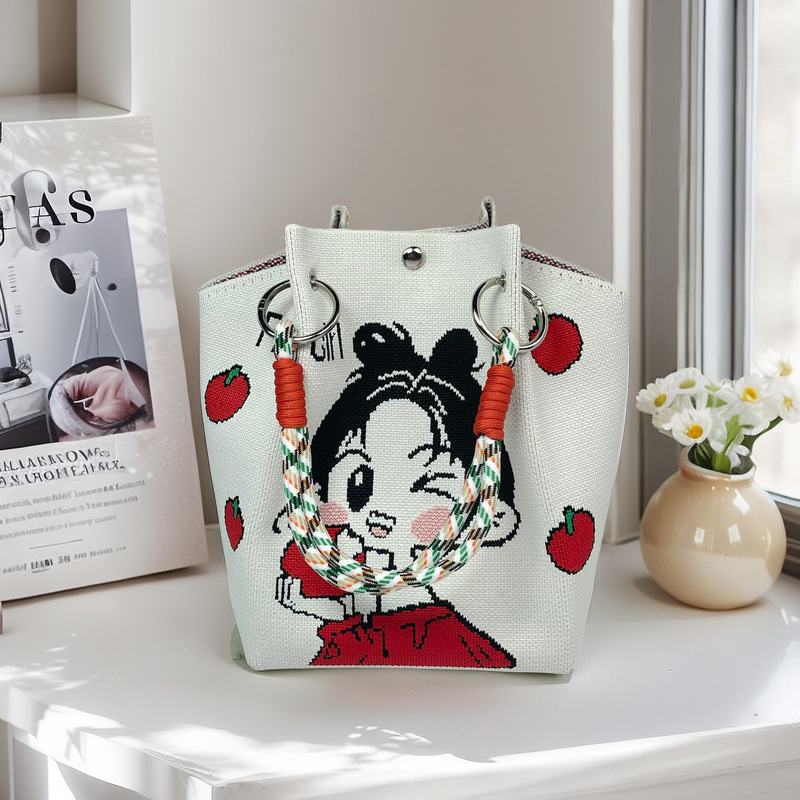 Moteriška megzta ovali cilindrinė rankinė bucket (Poliesteris; cilindrinė forma; magnetinis užsegimas; pamušalas poliesteris)