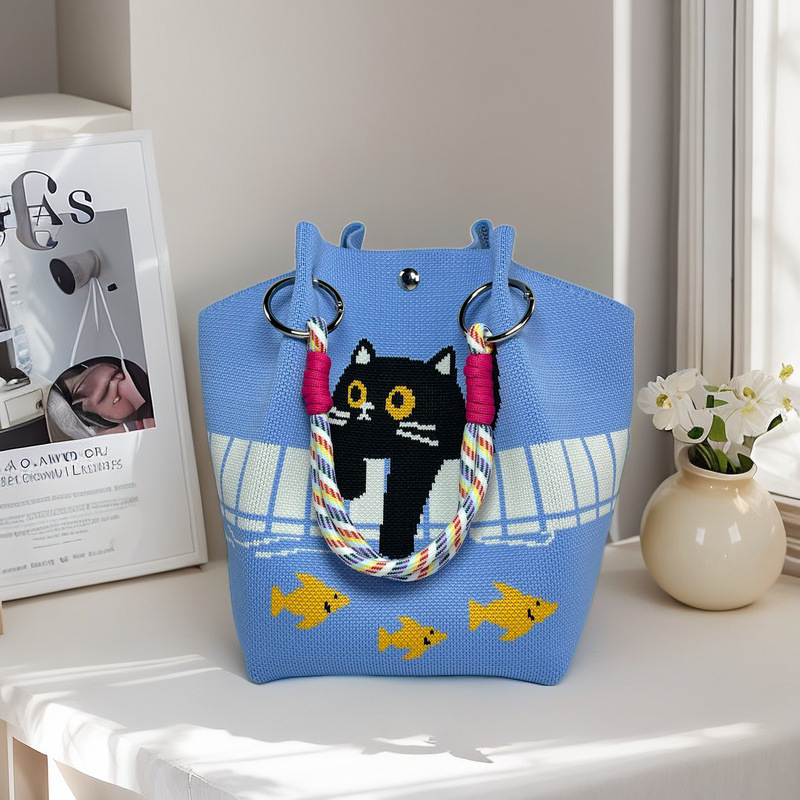 Moteriška megzta ovali cilindrinė rankinė bucket (Poliesteris; cilindrinė forma; magnetinis užsegimas; pamušalas poliesteris)