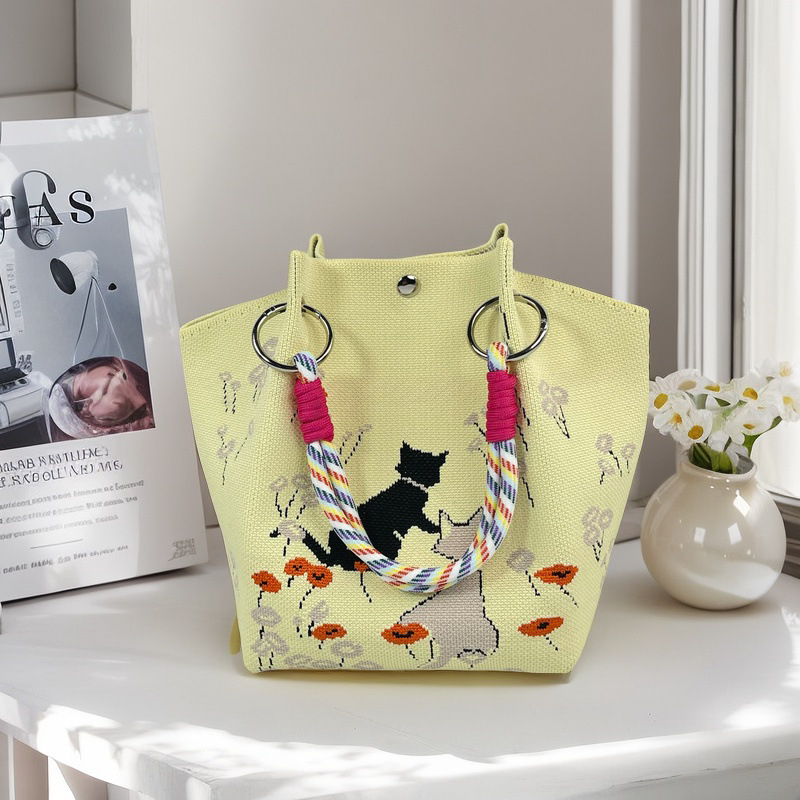 Moteriška megzta ovali cilindrinė rankinė bucket (Poliesteris; cilindrinė forma; magnetinis užsegimas; pamušalas poliesteris)