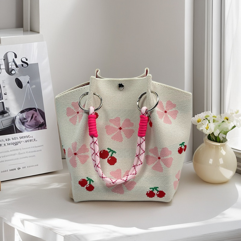 Moteriška megzta ovali cilindrinė rankinė bucket (Poliesteris; cilindrinė forma; magnetinis užsegimas; pamušalas poliesteris)