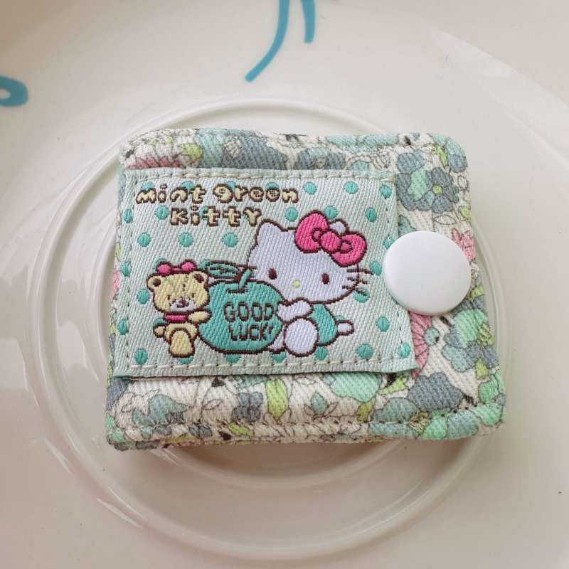 Hello Kitty kabelu organizatora klips, mazais modelis, vienkāršs vīšanas mehānisms, kokvilna, saderīgs ar datu kabeliem un austiņu kabeliem