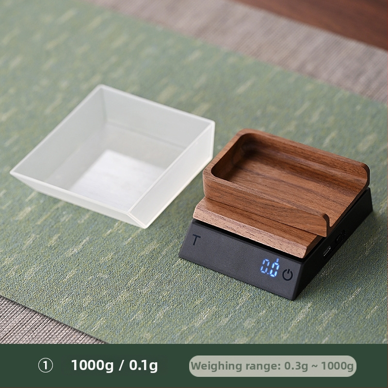 Diófa teás mérleg 0,1 g pontossággal, tartalmaz kis teáskanalat, modell JH-C30, teherbírás 2000 g, elektronikus mérés, beépített újratölthető akkumulátor