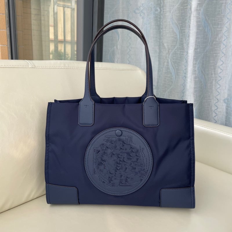 Geantă bucket din canvas pentru femei, cu căptușeală din nylon, închidere magnetică; buzunare interioare: fermoar, buzunar pentru telefon și ID.