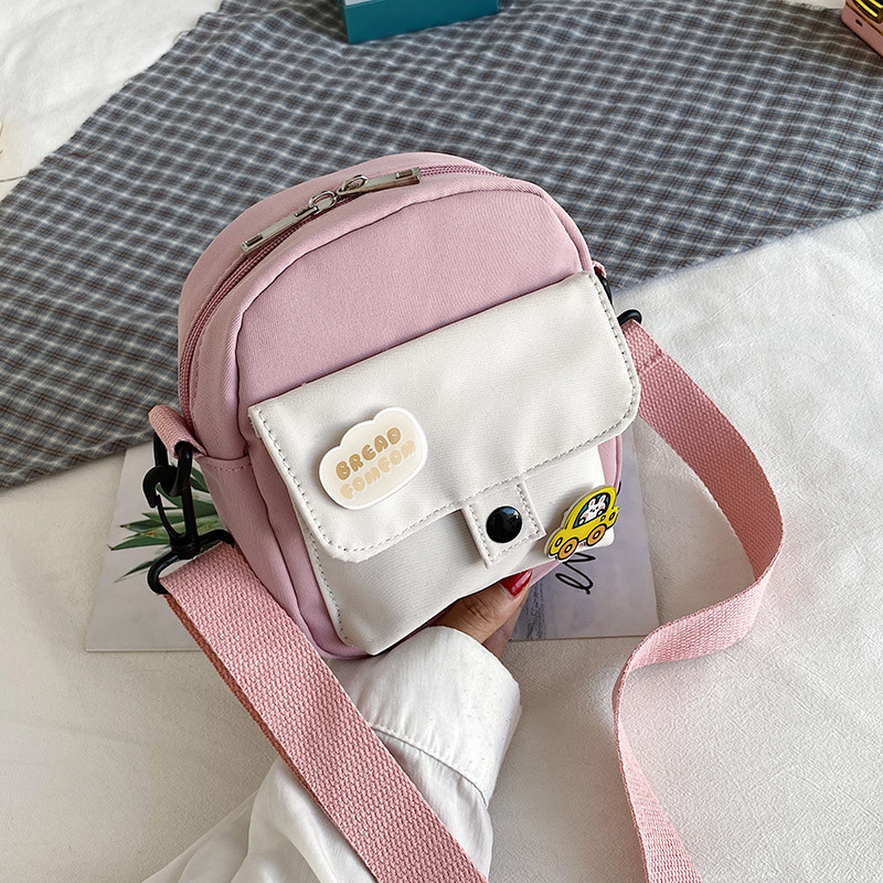 Crossbody torba od platna, mala kvadratna, uspravni dizajn, zatvaranje zatvaračem, Notelli