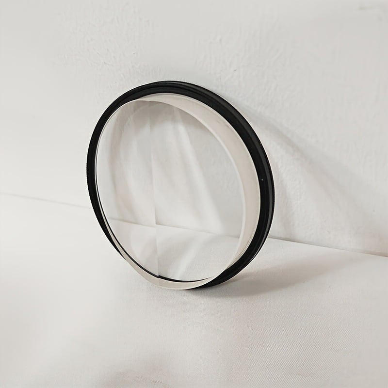 Szellemítő hatású, kétoldalas UV-szűrő kamerához, modell LJ06, bajonettszélességek 52–82 mm, kompatibilis a kamerákkal, tiszta feldolgozás.