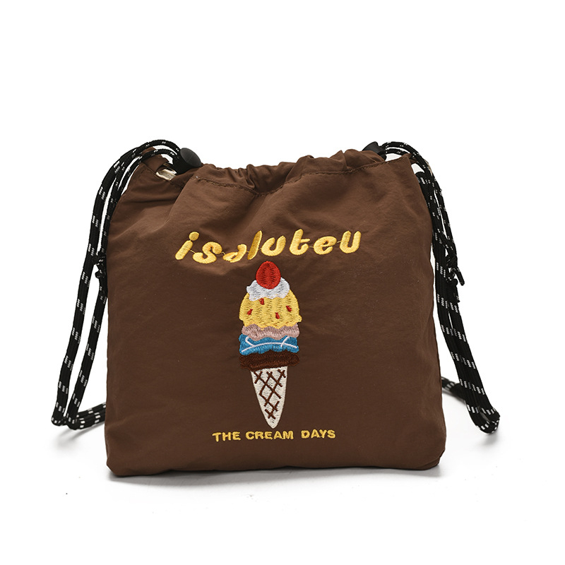 Najlon torbica preko ramena sa šnirnim zatvaranjem, vertikalni kvadratni oblik, unutarnja pretinica za telefon, jedan remen, svakodnevnu upotrebu