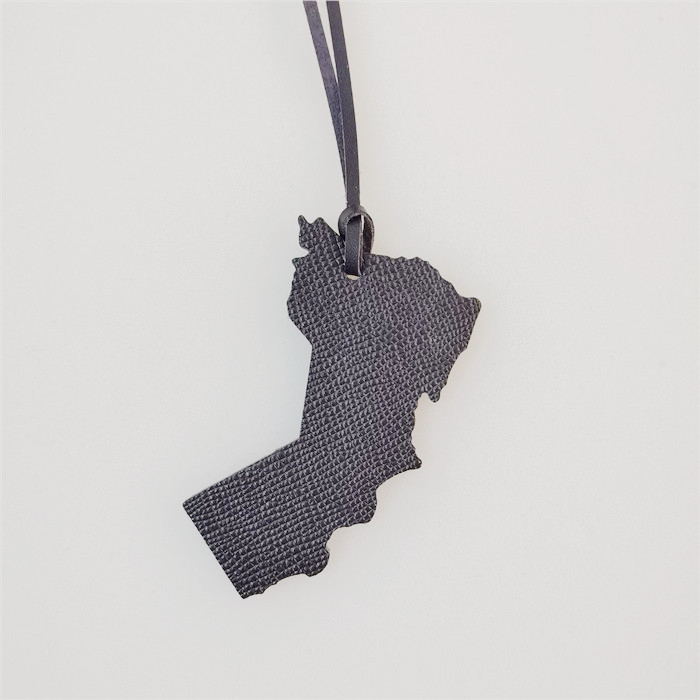 Somas piekariņš ar Omānas kartes dizainu – īsta āda