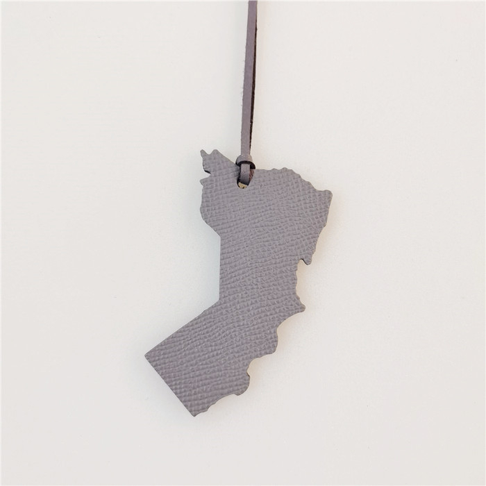 Somas piekariņš ar Omānas kartes dizainu – īsta āda