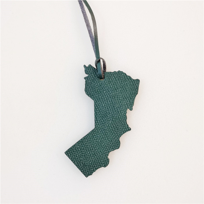 Somas piekariņš ar Omānas kartes dizainu – īsta āda