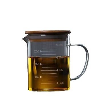 Hőálló üveg mérőedény skálával, fedéllel és fogantyúval