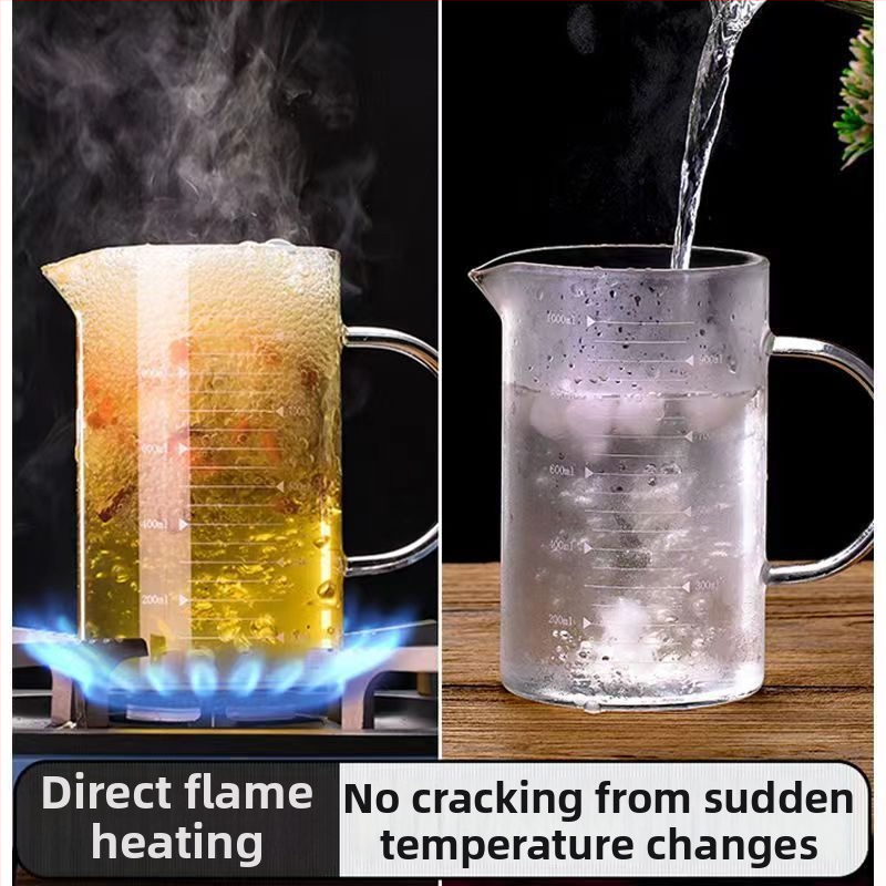 Stiklinė matuojamoji taurė atspari aukštoms temperatūroms, su skale, dangteliu ir rankena