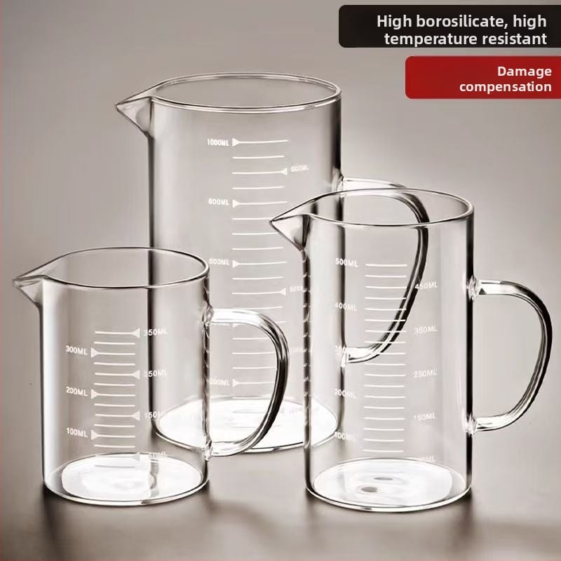 Hőálló üveg mérőedény skálával, fedéllel és fogantyúval